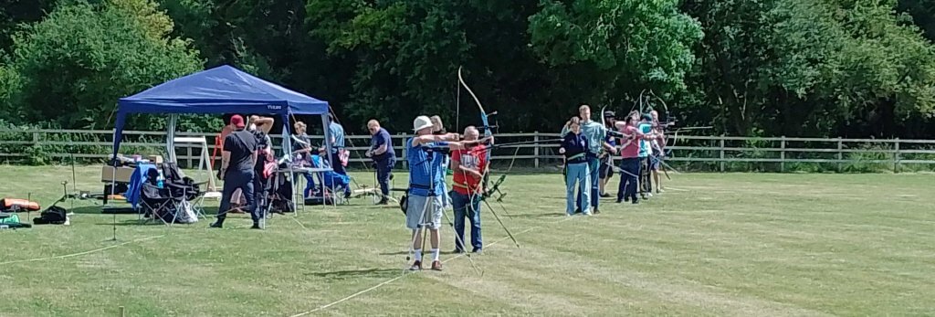 Archers shooting in the sunshine