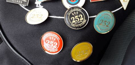 A selection of Archery award badges